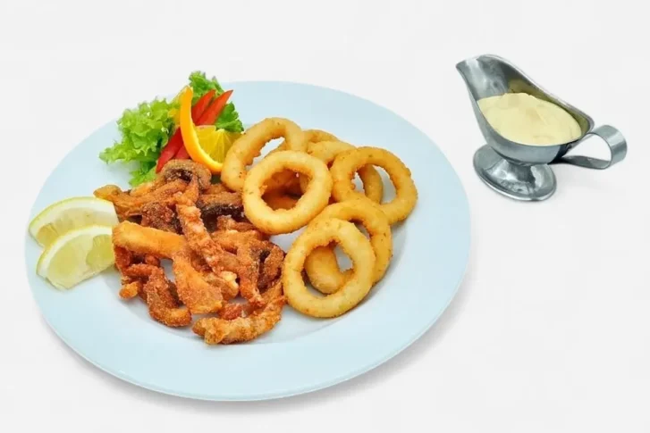 Haltepertő hagymakarikával tartármártással